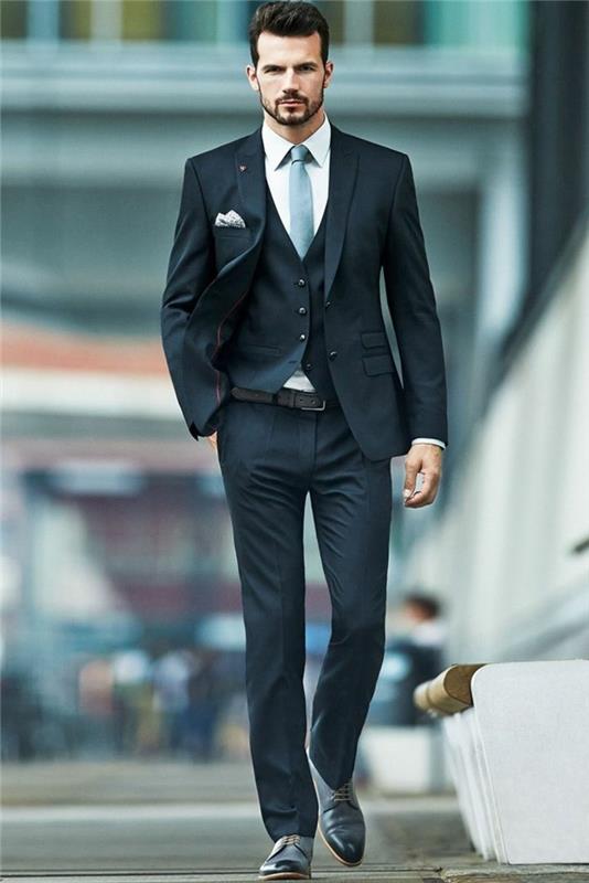 una scelta molto elegante per scegliere abiti da cerimonia uomo grigi con cravatta azzurra