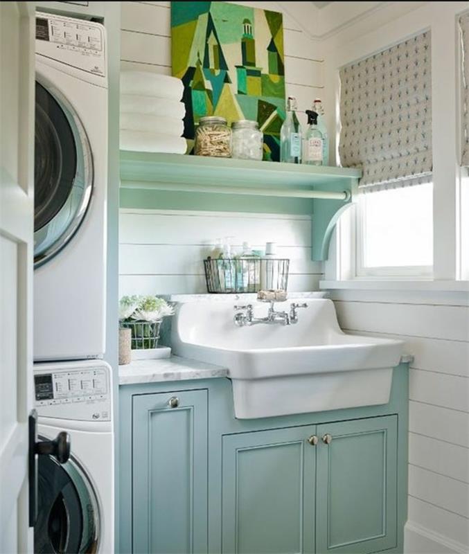 zamisel, kako urediti pralnico, beli umivalnik in pastelno modra toaletna miza, okrasna miza za slikanje v zeleni barvi, pralni stroji
