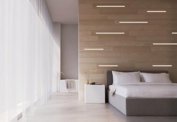 minimalistinis baltos ir pilkos spalvos miegamojo dizainas su medžio akcentais, šviesios medienos sienų dailylentės