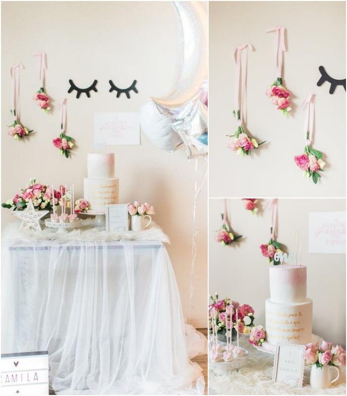 mehka in zračna dekoracija samopostrežnega bifeja za rojstni dan samoroga s krilom za mizo iz tila, visečimi šopki rož in baloni iz srebrne folije
