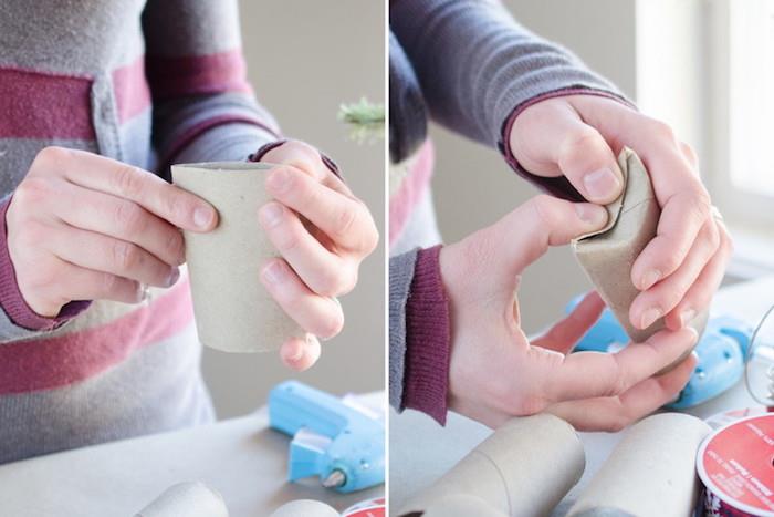 paprasta dovanų paketo pamoka iš perdirbto tualetinio popieriaus ritinėlio, sutraiškykite ritinį ir sulenkite galus į vidų, kad sukurtumėte mažą dėžutę