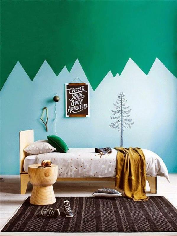 kahverengi ve gri tais square dağ ve orman desenleri ile boyalı bir duvar ile ördek mavisi ve ördek yeşili çocuk odası dekoru