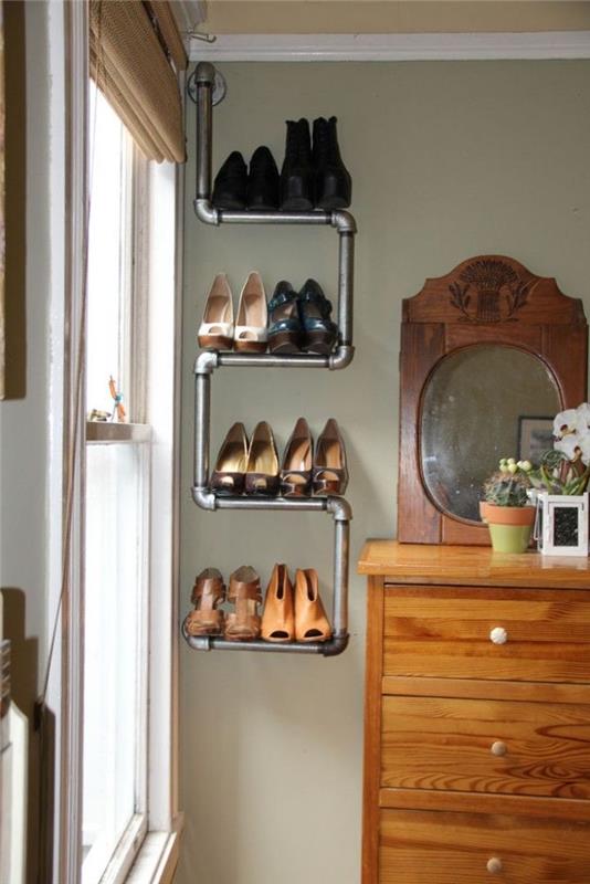 eski tuvalet masasının aksine sıhhi tesisat borularından yapılmış üç katmanlı geri kazanılmış ayakkabı rafı