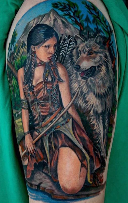 tetovaža volk ženska, simbolična barvna risba na koži, naravna pokrajina z žensko in volkom pred tetovažami gora