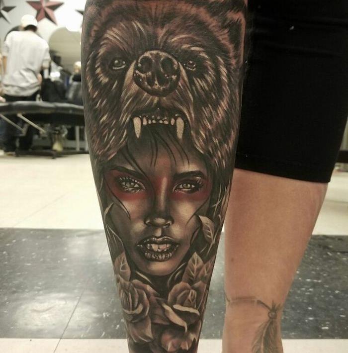 tetovaža volčja ženska, ženski obraz v rdečem ličenju z ostro volčjo glavo