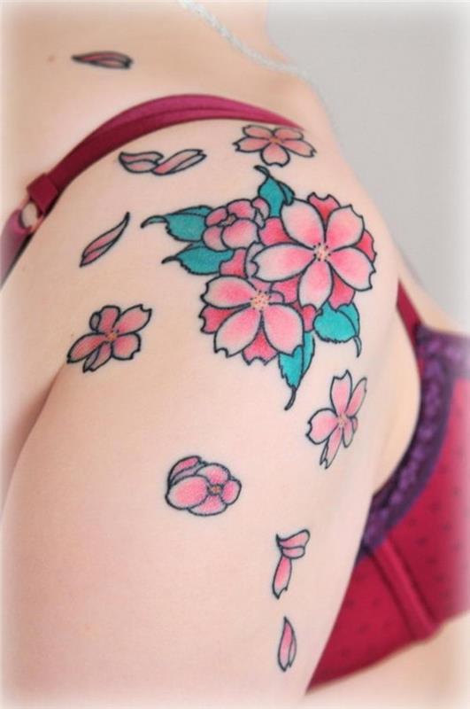 ideja tetovaže efemere 6 mesecev barve rože roza modra ramena ženska