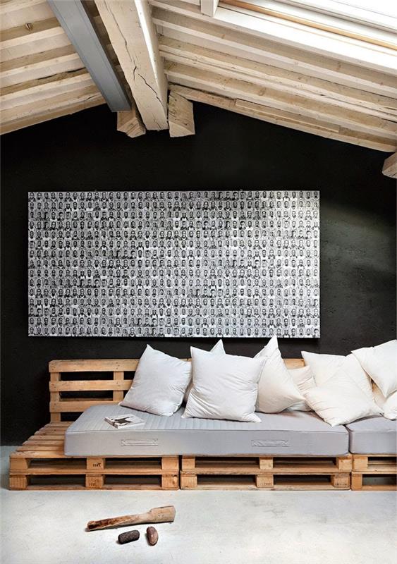 rahat bir palet kanepe ile çatı katı yatak odasının modern düzeni