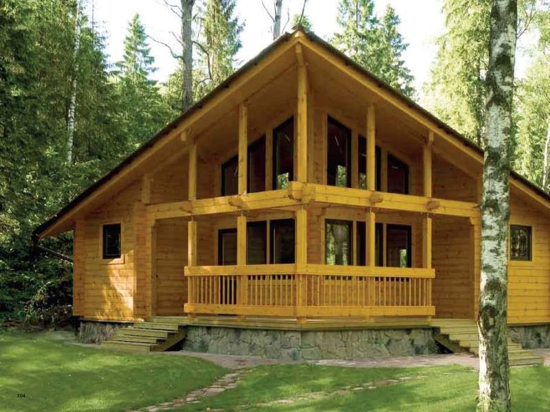 casa feita de madeira na floresta