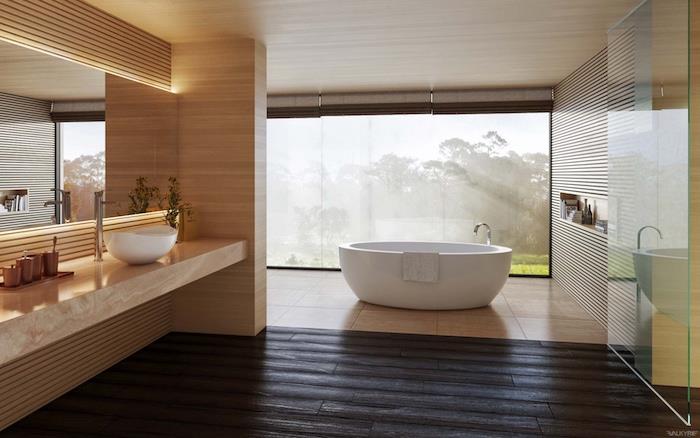 Küvetli ve güzel orman manzaralı geniş banyo, gri ve beyaz banyo tasarımı, güzel banyo aksesuarları