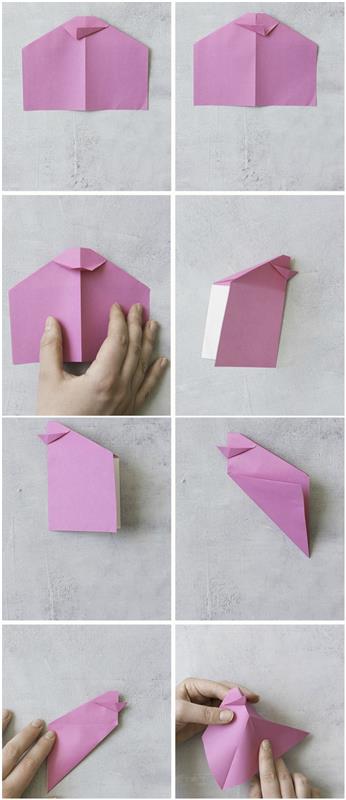 şenlikli bir masanın dekorasyonu için renkli bir kuş origami modeli, paskalya partisi için manuel aktivite