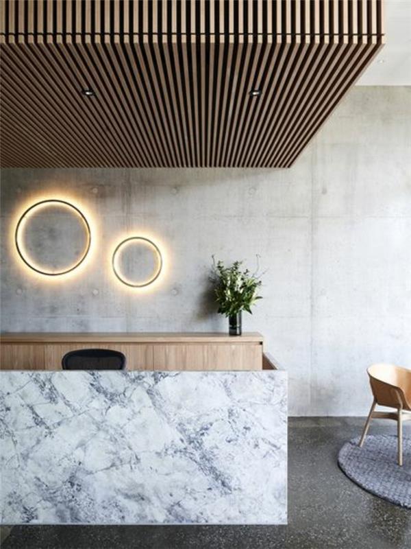 interjeras-betonas-dekoratyvinis-stalviršis-vaškuotas-betonas-dekoratyvinis-betonas-pilkas-grindys-smėlio spalvos sienos