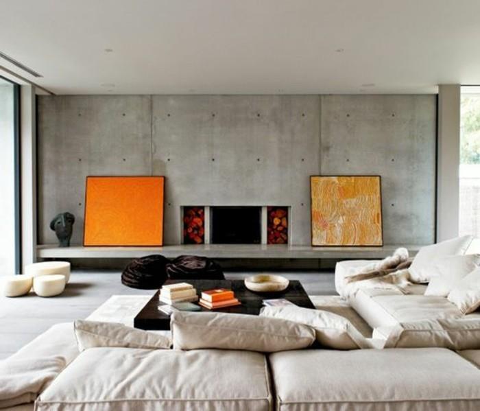 modernus-interjeras-svetainei-betonas-dekoratyvinis-betonas-stalviršis-vaškas-sofa-smėlio spalvos