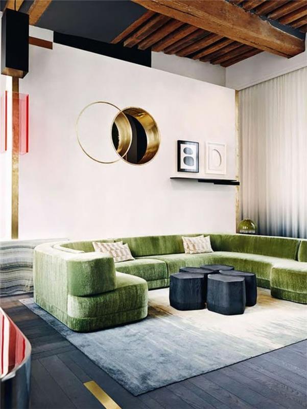 güzel-yuvarlak-köşe-kanepe-yeşil-bej-halı-bej-duvarlar-modern-oturma odası