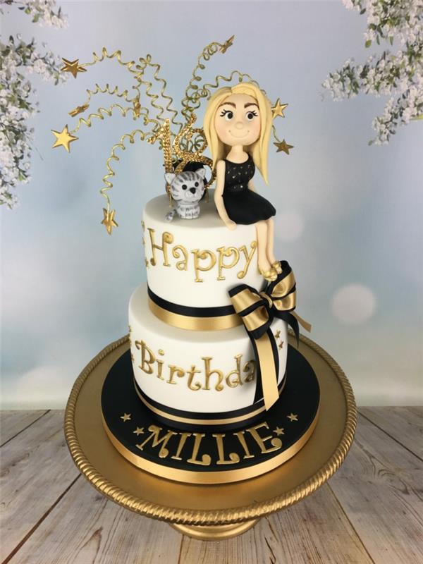 juodos ir baltos mergaitės gimtadienio tortas, katė ir mergaitė, sėdinčios ant torto