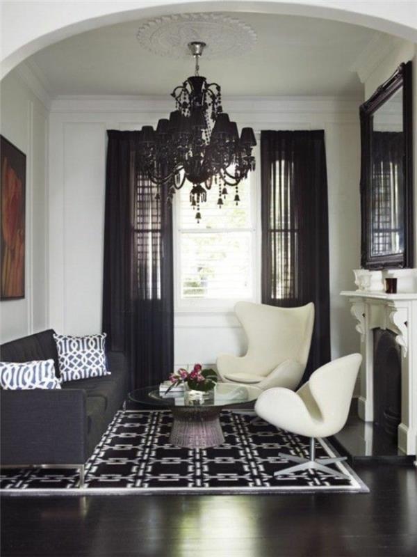 graži svetainė su juodu muilu grindimis-parketas-juoda liustra ir balta lubos-juoda sofa