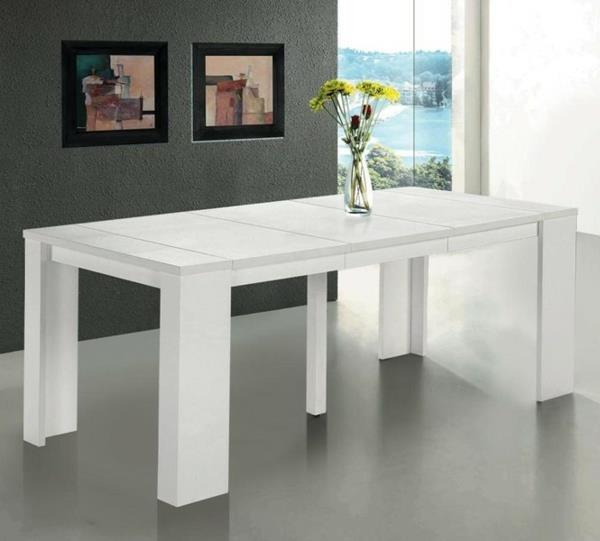 precej velika miza v beli barvi in ​​slikarska dekoracija