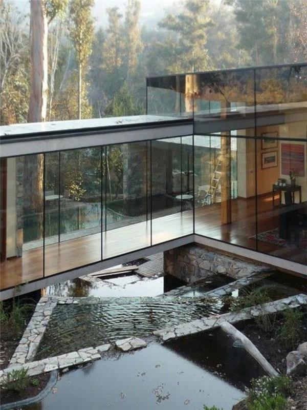 gana šiuolaikiškas namas su dideliais stiklo langais-bioklimatinė-veranda-bioklimatinė-pavėsinė