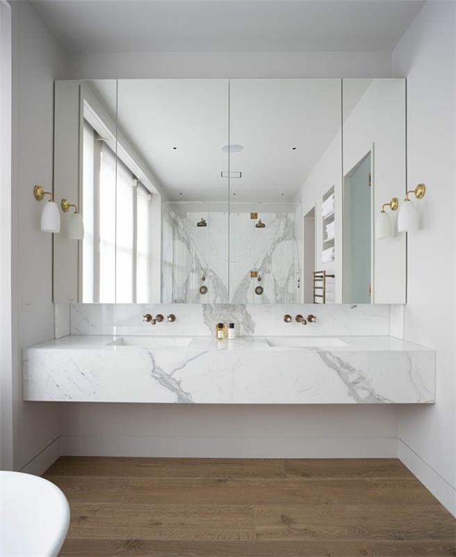 gražus-marmurinis balnche-vonios kambarys-modeliai-balti-vonios kambariai-didelis veidrodis-vonioje
