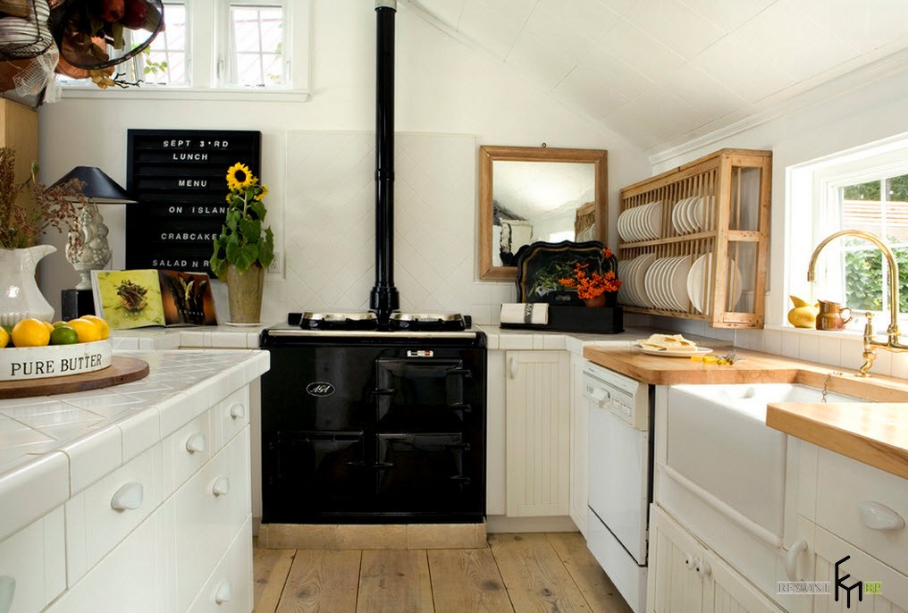 İskandinav tarzı bir mutfakta siyah soba İskandinav tarzı bir mutfakta siyah soba