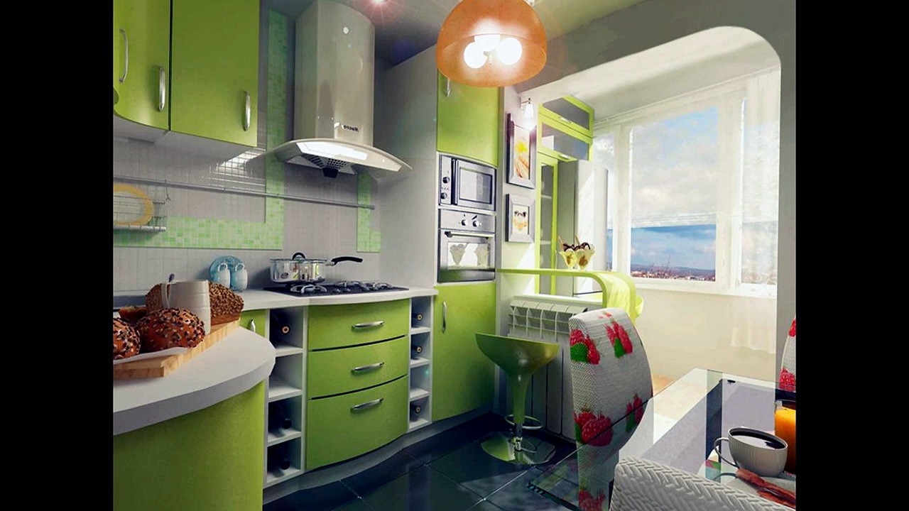 バルコニー付きの緑のキッチン