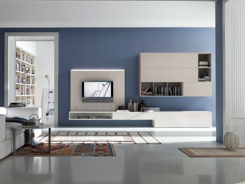 paredes azules con muebles blancos