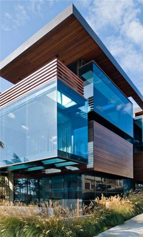 minimalistinio stiliaus stiklo namo menas šiuolaikinės architektūros stiklo terasoje