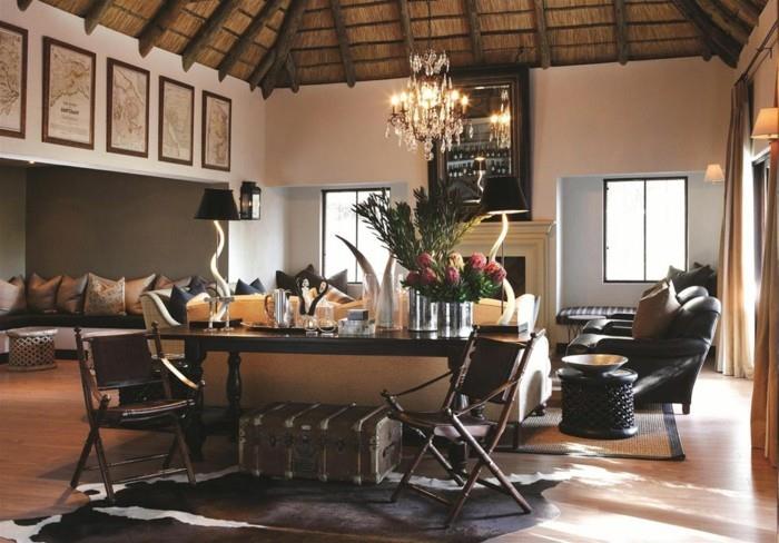Afriška svetilka-strop-iz-slame in lesa-blazine-kavč-fotelj