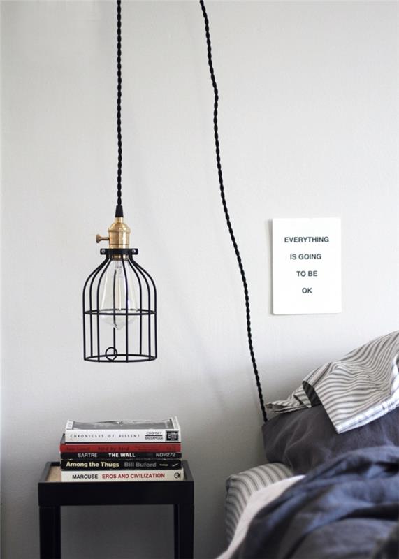 minimalist bir tarza sahip bir yatak odasında temiz bir tasarıma sahip bir kafes lambası, modern aydınlatma