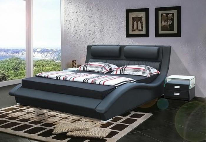tasarım-yatak-180x200-deri-yatak-bej-halı-geniş-çift kişilik-siyah-deri-ve-siyah-fayans-geniş pencereli-yatak