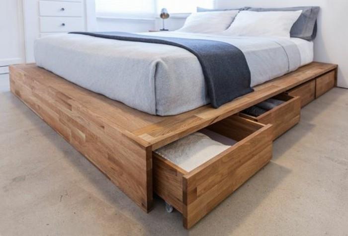 postelja-predal-postelja-s-shranjevanjem-v-predalih-v-lesu-beton-tla-posteljno perilo-svetlo modra