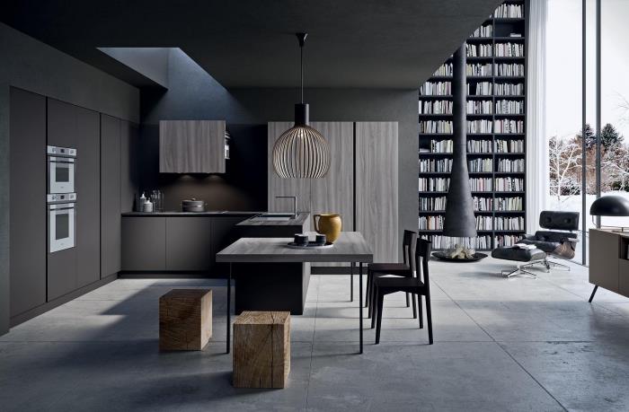 ada yemek masası ile mat siyah l şeklinde mutfak modeli, koyu renklerde modern iç tasarım