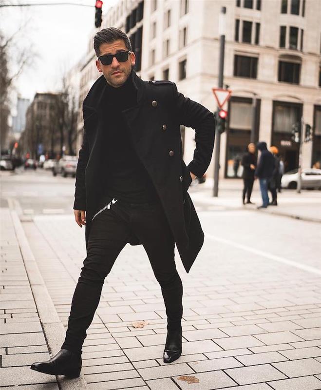 Ilgas juodas paltas, juodos siauros kelnės, prašmatnus vyriškas drabužis, glamūrinis stilius vyriškiems kostiumams nuo saulės
