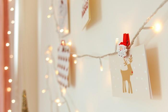šventės magija su šviesiomis Kalėdų girliandos namų detalėmis