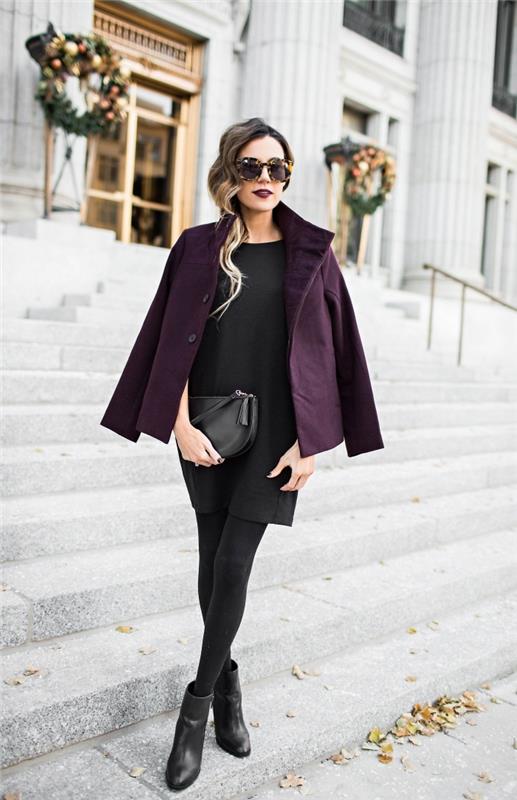 moteriška tunika, elegantiška išvaizda juoda tunika ir purpurinis kailis, šukuosena ilgų garbanotų plaukų šone