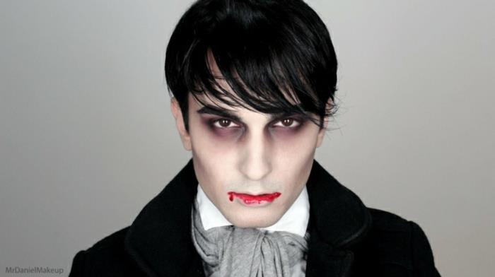 berniuko vampyro makiažas, kruvinos lūpos, juodos akiduobės, pilkas drugelis, balti marškiniai, juoda striukė