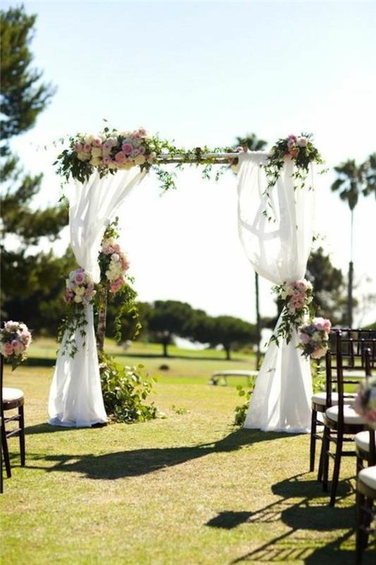 vestuvės po atviru dangumi-arkos-vestuvės-tiulio-puokštės-gėlės