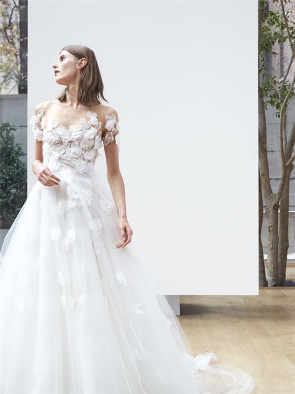 originali vestuvių suknelės idėja su baltų lapų liemeniu ir tiulio sijonu bei išsiuvinėtomis gėlėmis