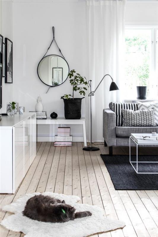 skandinaviškas-tv-spintelė-skandinaviško stiliaus interjeras-skandinaviški baldai-juodas kilimas-svetainė
