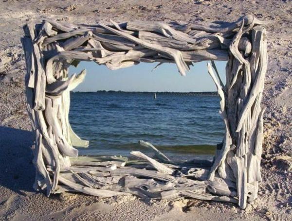 driftwood-mirror-on-a-beach