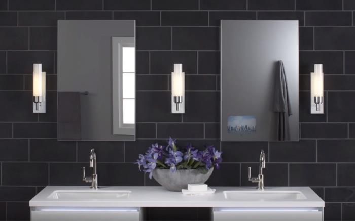 sodobno oblikovanje kopalnice z dodatki in pametnimi napravami z neonsko razsvetljavo, antracitno sive ploščice v opečni izvedbi