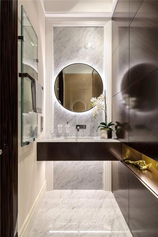 apvalios formos-marmurinis-vonios kambarys-veidrodis-su apšvietimu