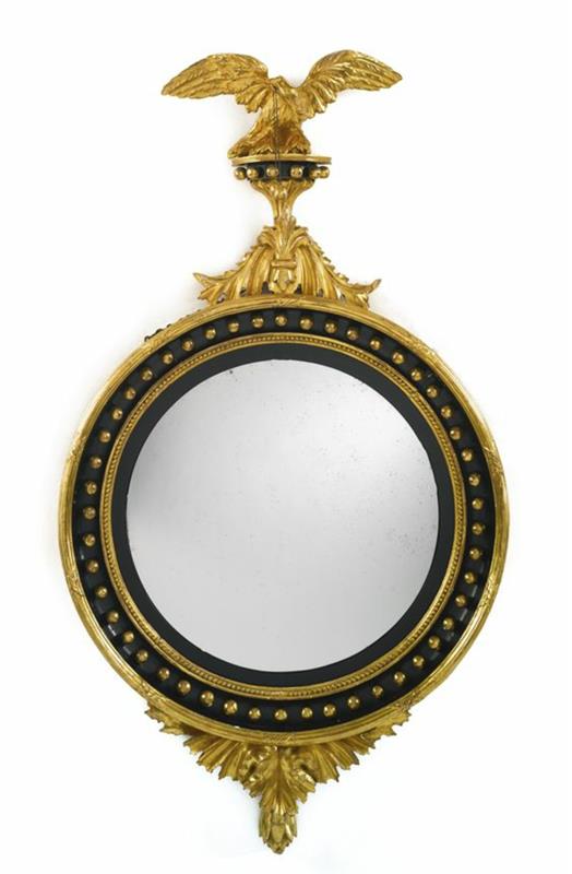 raganos veidrodis imperijos stiliaus su ereliu virš auksinio rėmo