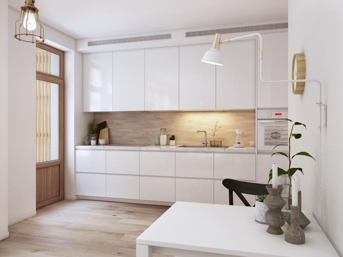 postavitev kuhinje, kuhinjski dekor v skandinavskem slogu z belimi stenami in lesenimi tlemi