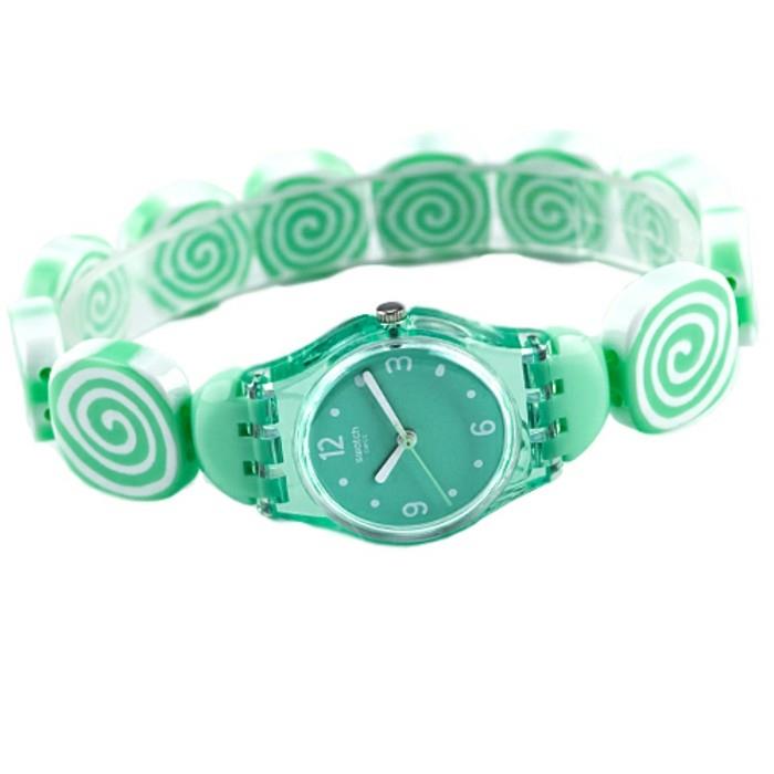 ročna ura z zelenimi bonboni, spremenjene velikosti
