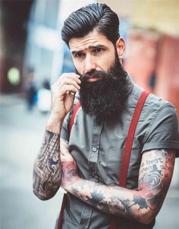 hipsterski model človek z veliko brado pompadour cut tetovaže naramnice