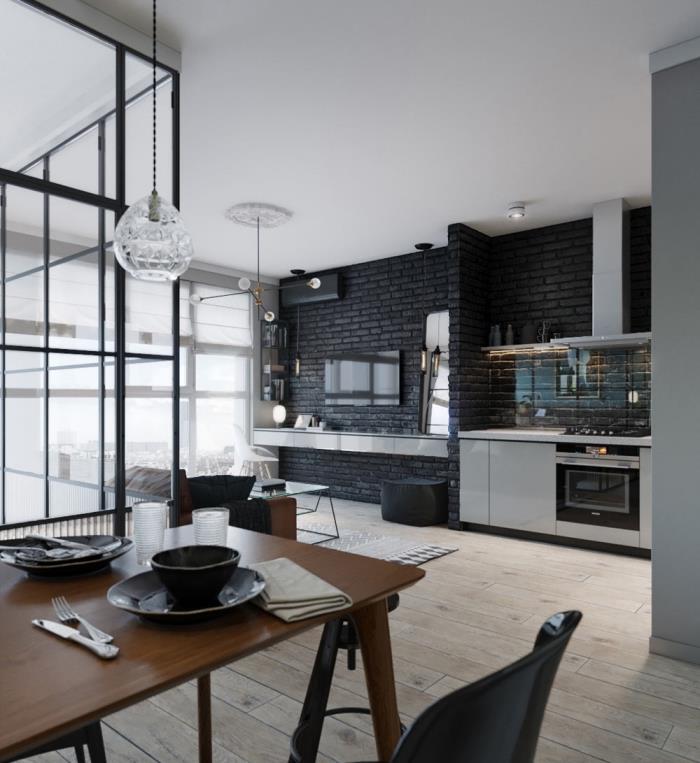 mutfakta bir duvar nasıl dekore edilir, açık renkli ahşap parke ile siyah ve gri modern mutfak örneği