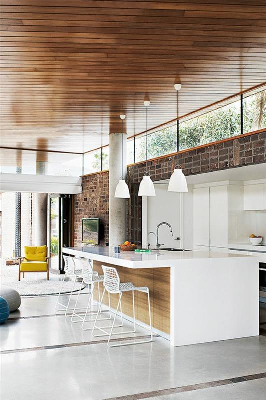 plytų siena-itin moderni-atviro išplanavimo virtuvė