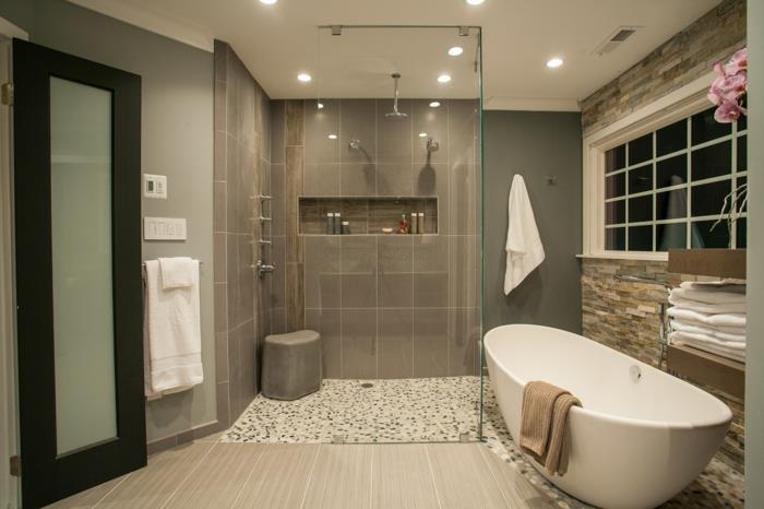 tasarım banyo, beyaz küvet, dekoratif çakıl taşları, duşa kabine entegre raf