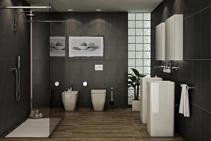 pilka vonios kambario apdaila su dušo kabina ir dviguba kriaukle, vonios idėja su pilkomis sienomis ir medinėmis grindimis