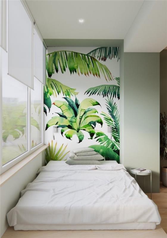 Sizi rahatlatıcı yatak odasına kaçmaya davet eden duvarın bir bölümü için tropikal yatak başı duvar kağıdı